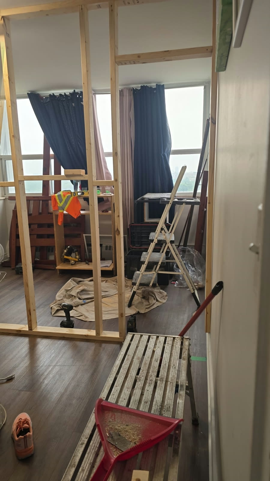 Bedroom during: partition wall studs framed and squared